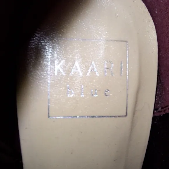 A pair of Kaari Blues Kensie burgundy booties in a ladies size 8.5.
