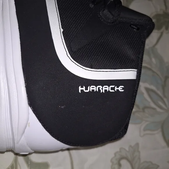 A pair of Nike Hurache baseball shoes. Like new condition. In a mens size 16.