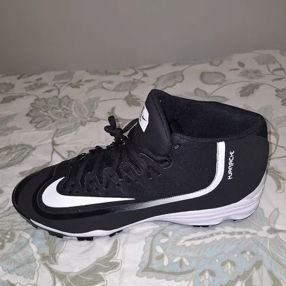 A pair of Nike Hurache baseball shoes. Like new condition. In a mens size 16.