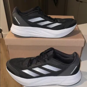 Adidas Black and White Running Shoes