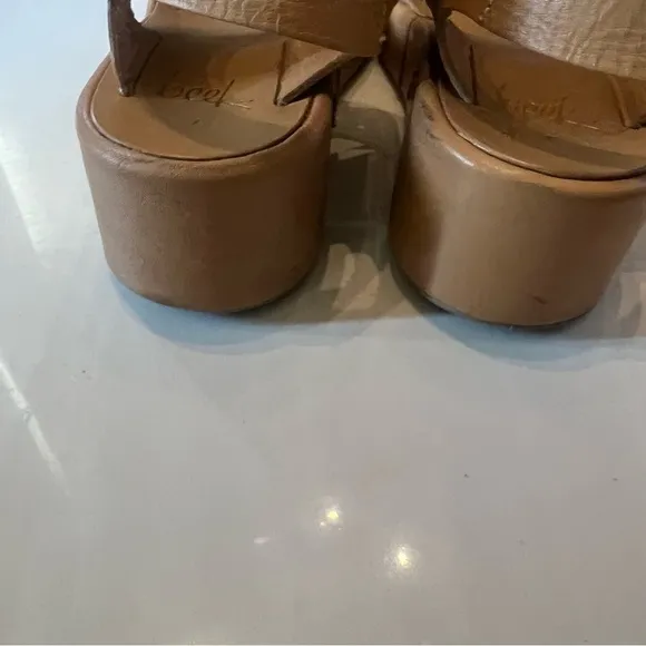 Beak swan platform sandals.