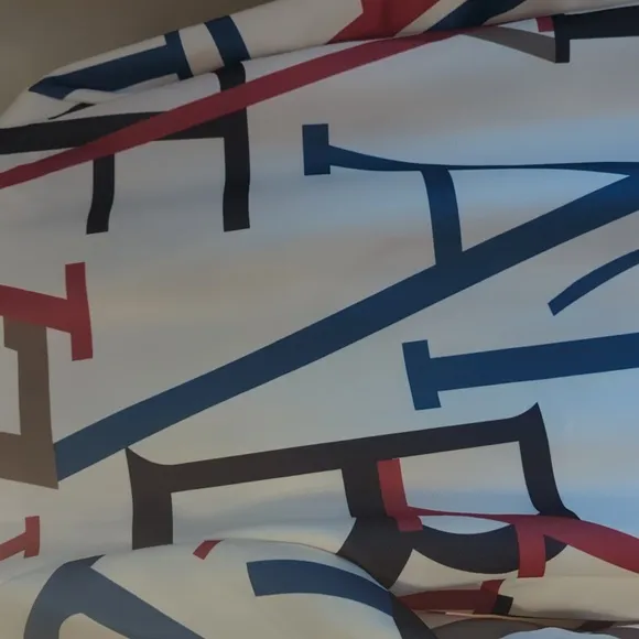 Beautiful coat with abstract letters