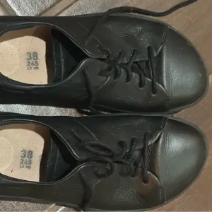 Birkenstock Black Sneakers with Leather-Like Finish