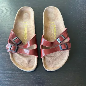 Birkenstock patent sandals maroon ladys 9, men’s 7