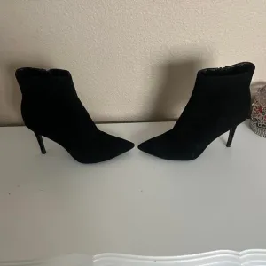 Black suede ankle boots