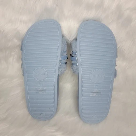 Guess faux fur slides sandals.