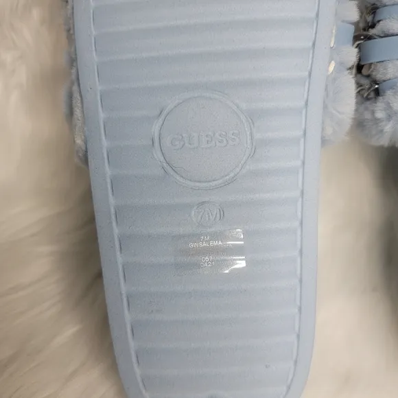 Guess faux fur slides sandals.