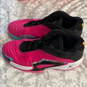 Jordan Pink and Black Athletic Shoes