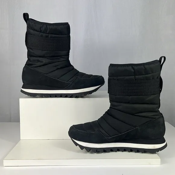 MERRELL Alpine Tall Strap Polar Waterproof Boots in Black.