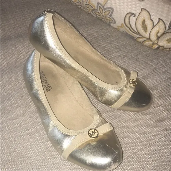 Michael Kors gold “Rover Lux” flats