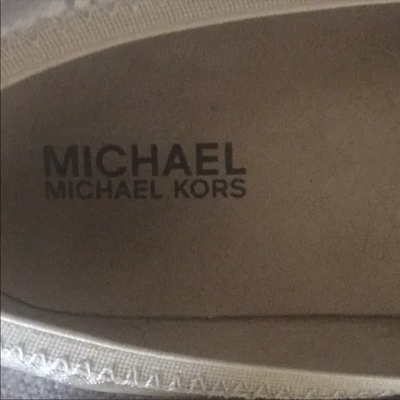 Michael Kors gold “Rover Lux” flats