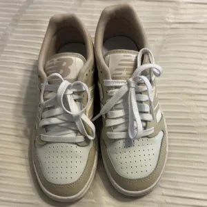 New Balance Cream and White Athletic Shoes