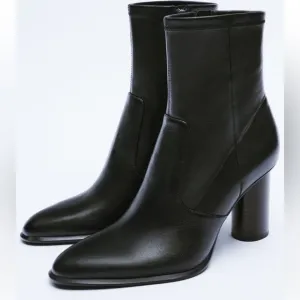 New! Zara SZ 6, black leather heeled zippered ankle boots.