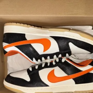 Nike Black and Orange Athletic Shoes with Retro Design