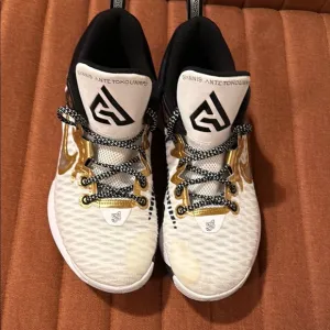 Nike White and Gold Athletic Shoes