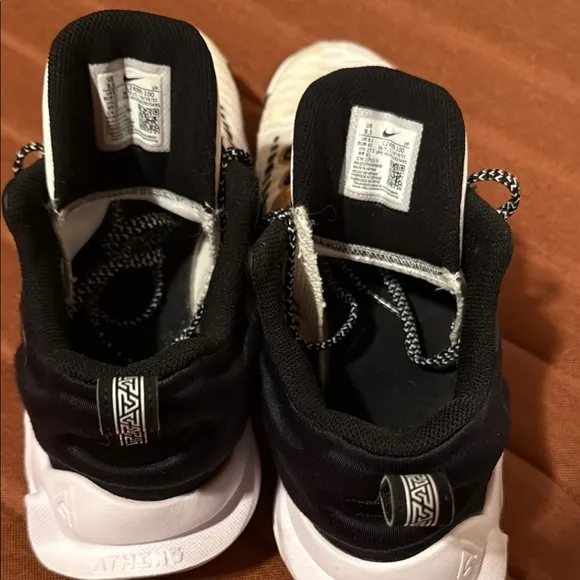 Nike White and Gold Athletic Shoes