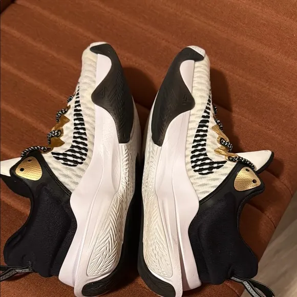 Nike White and Gold Athletic Shoes