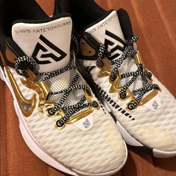 Nike White and Gold Athletic Shoes