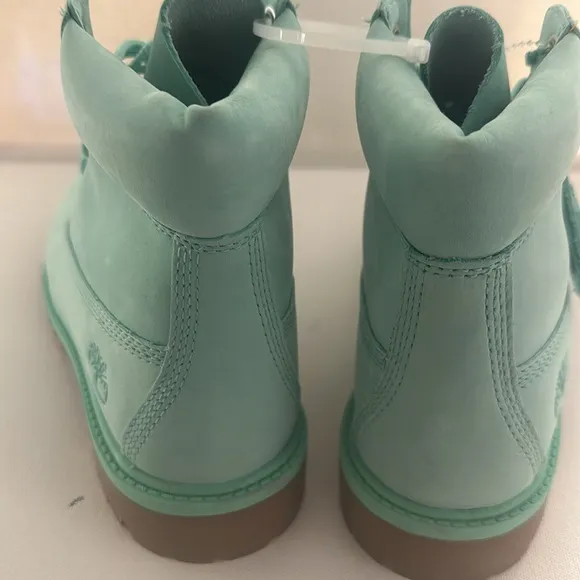 Timberland Ankle High Boots with lace up and tag. Size 4