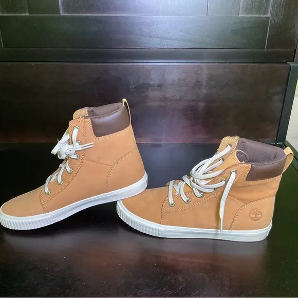 Timberland Tan High-Top Boots. Size 9.5. Never worn.