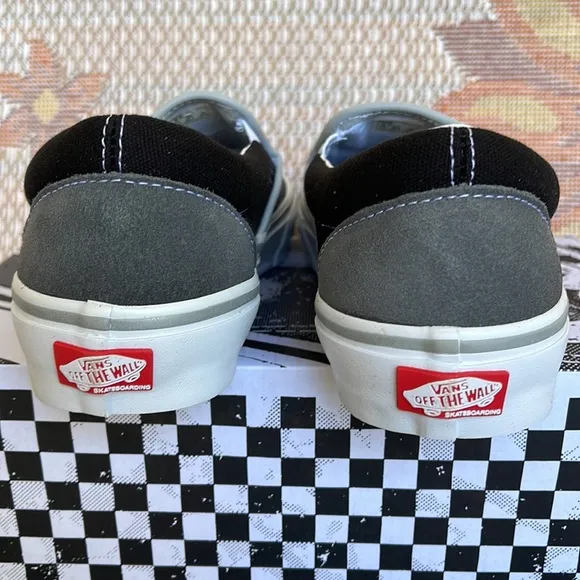 Vans Men’s Skate Slip-OnReflective Black/GreyVN0A5FCAN42Sneakers