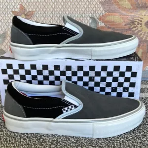 Vans Men’s Skate Slip-OnReflective Black/GreyVN0A5FCAN42Sneakers