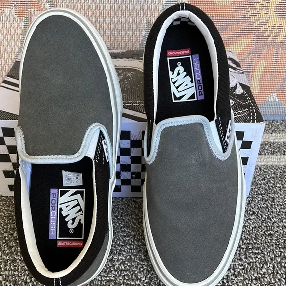 Vans Men’s Skate Slip-OnReflective Black/GreyVN0A5FCAN42Sneakers