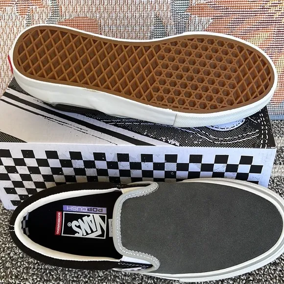 Vans Men’s Skate Slip-OnReflective Black/GreyVN0A5FCAN42Sneakers